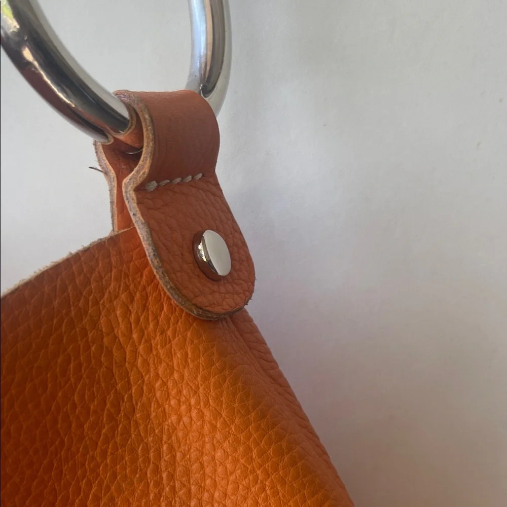 Chic‎ Orange Hobo Bag with Silver Accents